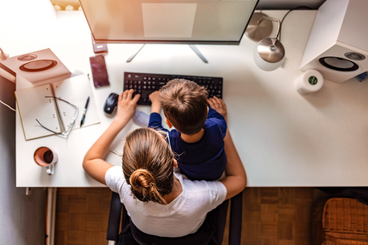 Flexible working for schools parent and child working at home