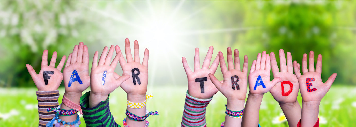Hands showing the words fair trade