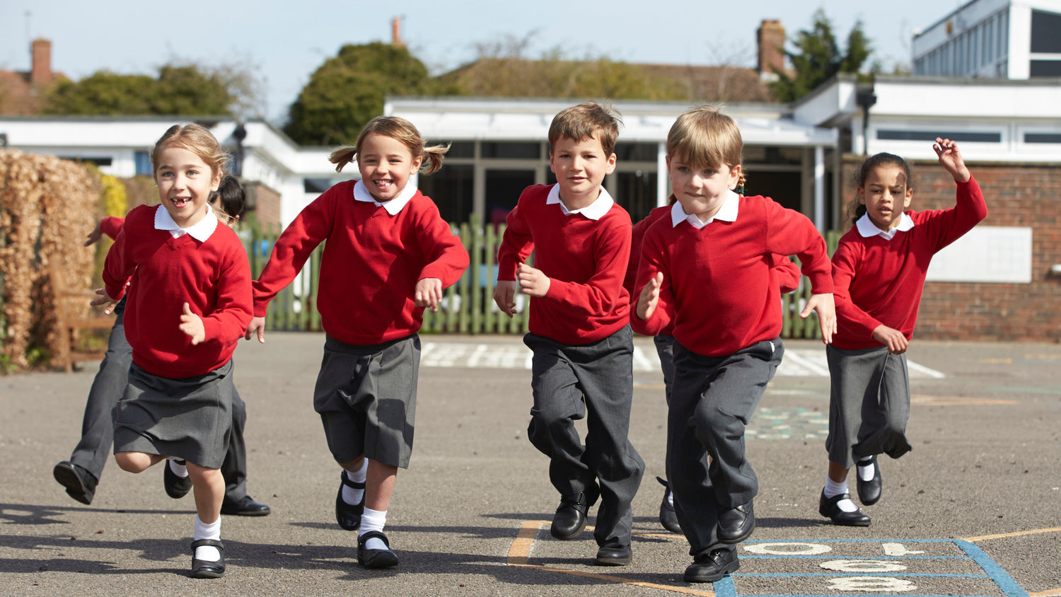 Children running together in the play ground